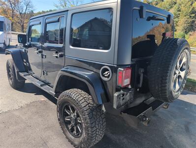 2017 Jeep Wrangler Unlimited Sahara   - Photo 2 - St. Johnsbury, VT 05819