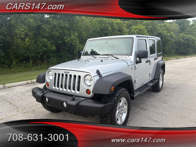 2012 Jeep Wrangler Unlimited Sport   - Photo 1 - Midlothian, IL 60445