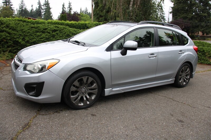White 2012 Subaru Impreza Hatchback All-Wheel Drive Automatic