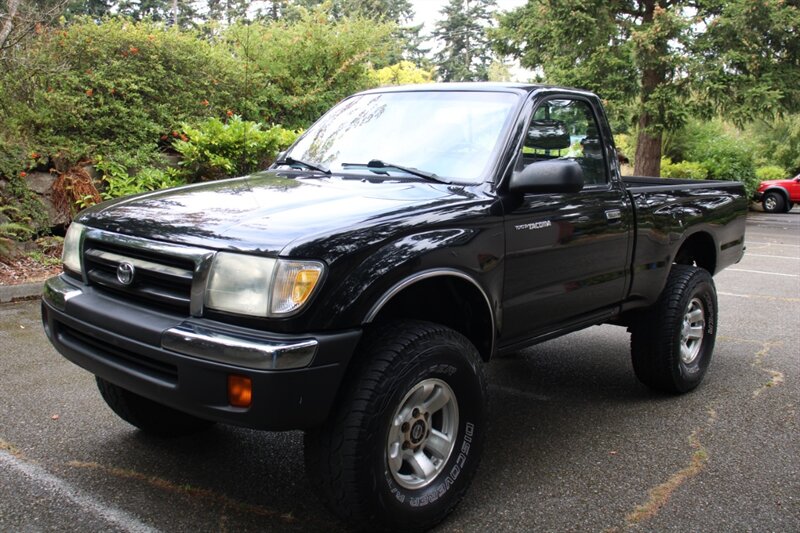 Black 2000 Toyota Tacoma Pickup Truck Four-Wheel Drive 5-Speed Manual