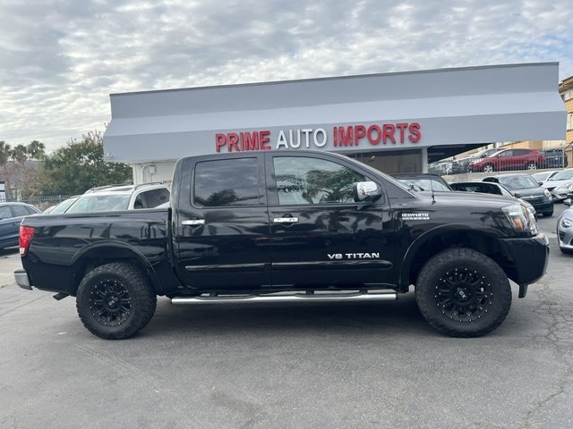 Galaxy Black 2014 Nissan Titan Pickup Truck Four-Wheel Drive Automatic