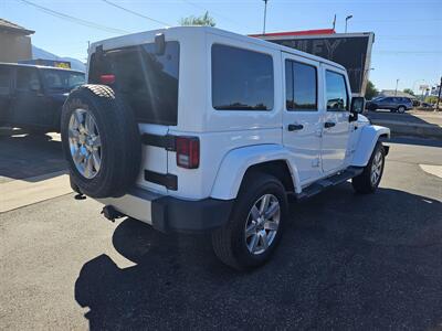 2014 Jeep Wrangler Unlimited Sahara   - Photo 7 - Ogden, UT 84401