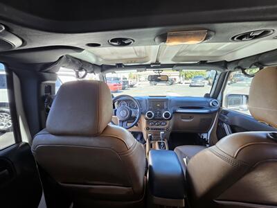 2014 Jeep Wrangler Unlimited Sahara   - Photo 15 - Ogden, UT 84401