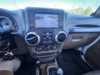 2014 Jeep Wrangler Unlimited Sahara   - Photo 17 - Ogden, UT 84401