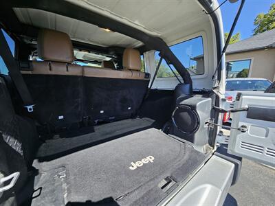 2014 Jeep Wrangler Unlimited Sahara   - Photo 13 - Ogden, UT 84401