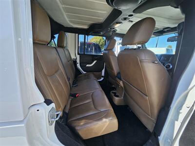 2014 Jeep Wrangler Unlimited Sahara   - Photo 14 - Ogden, UT 84401
