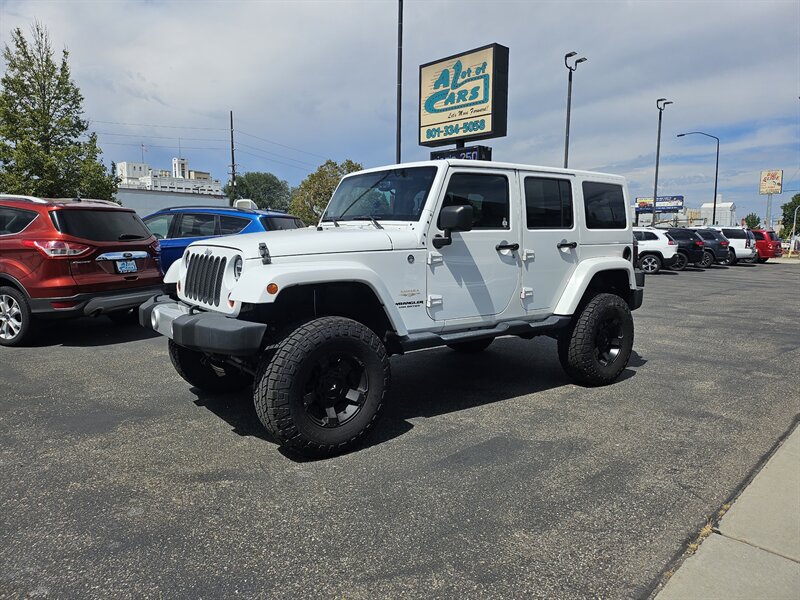 2013 Jeep Wrangler Unlimited Sahara   - Photo 1 - Ogden, UT 84401