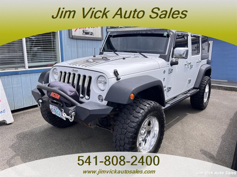2015 Jeep Wrangler Sport - Photo 1 - North Bend, OR 97459