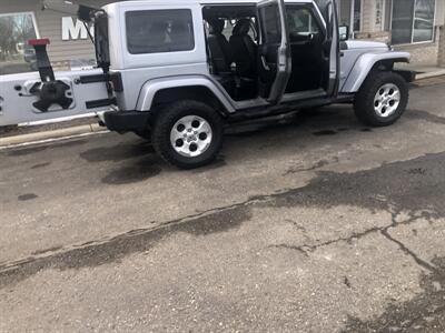 2014 Jeep Wrangler Unlimited Sahara   - Photo 9 - Owatonna, MN 55060