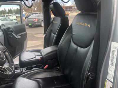 2014 Jeep Wrangler Unlimited Sahara   - Photo 12 - Owatonna, MN 55060