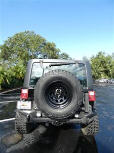 2015 Jeep Wrangler Unlimited Sport S   - Photo 13 - Naples, FL 34104