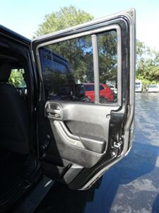 2015 Jeep Wrangler Unlimited Sport S   - Photo 53 - Naples, FL 34104