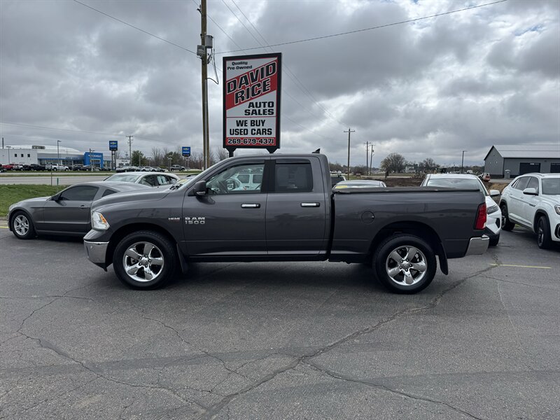 Gray (Granite Crystal Metallic Clear Coat) 2017 RAM 1500 Big Horn Quad Cab 4WD Pickup Truck Four-Wheel Drive Automatic