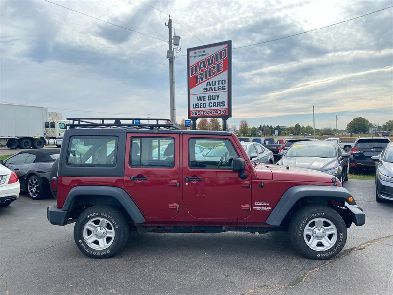 2013 Jeep Wrangler Unlimited Sport - Photo 1 - Schoolcraft, MI 49087