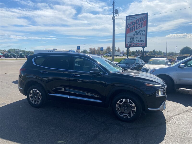 2023 Hyundai SANTA FE Hybrid Blue - Photo 1 - Schoolcraft, MI 49087