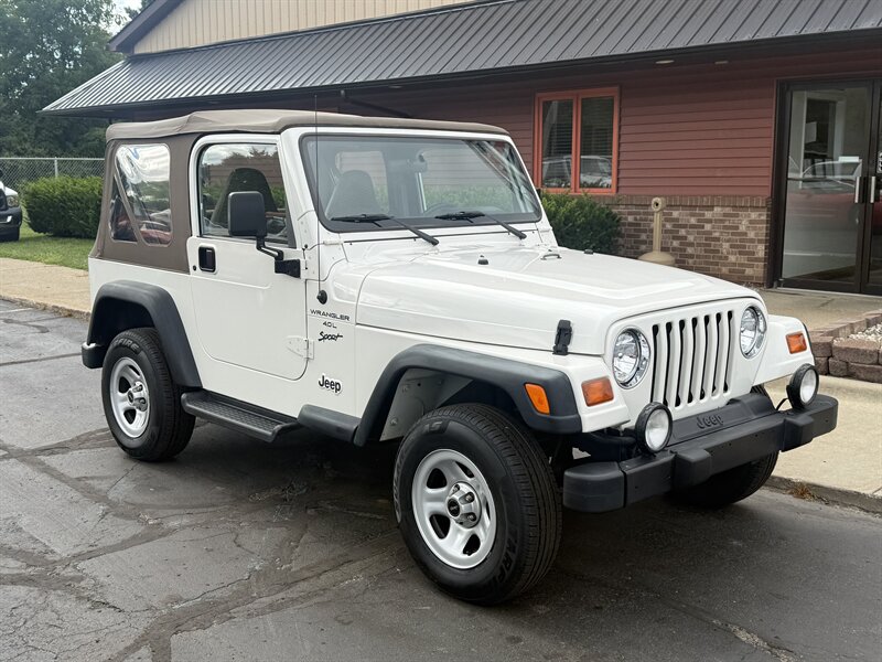 1999 Jeep Wrangler Sport 4X4 - Photo 1 - Flushing, MI 48433