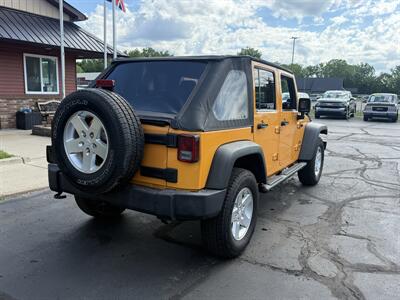 2012 Jeep Wrangler Unlimited Sport 6-Speed 4X4 - Photo 7 - Flushing, MI 48433