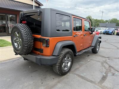 2010 Jeep Wrangler Unlimited Mountain  4X4 - Photo 5 - Flushing, MI 48433