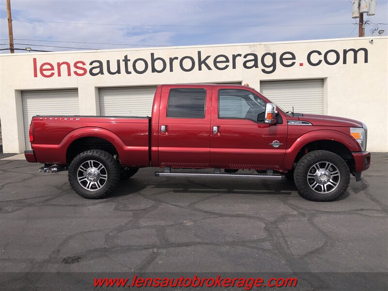 Red (Burgundy) 2016 Ford F-350 Super Duty Pickup Truck Four-Wheel Drive Automatic