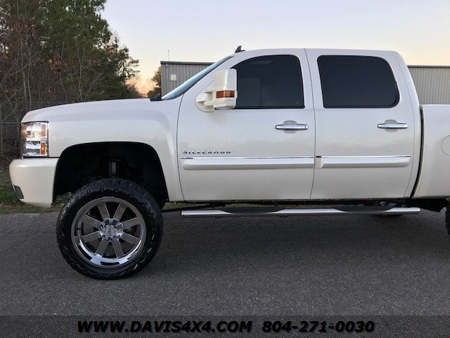 white chevy trucks jacked up