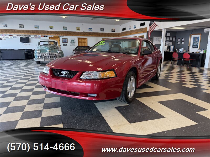Laser Red Tinted Clearcoat 1999 Ford Mustang Coupe Rear-Wheel Drive Automatic