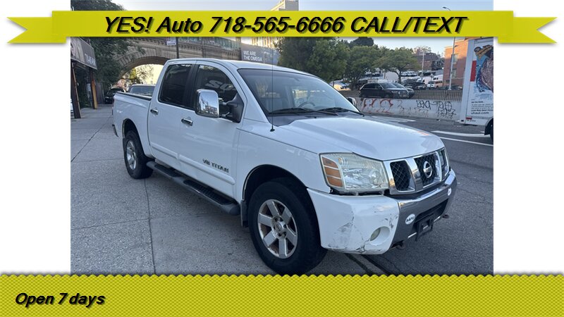 Black 2006 Nissan Titan Pickup Truck Four-Wheel Drive Automatic