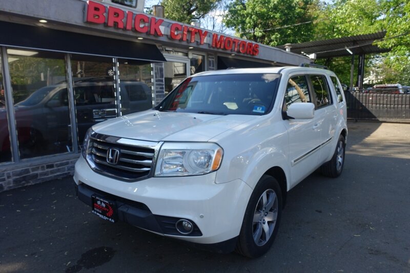 2014 Honda Pilot 4WD Touring w/RES & Navigation's photo
