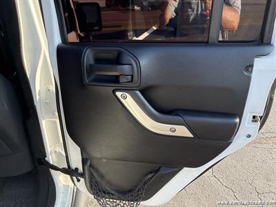 2015 Jeep Wrangler Unlimited Sahara   - Photo 19 - Lexington, TN 38351