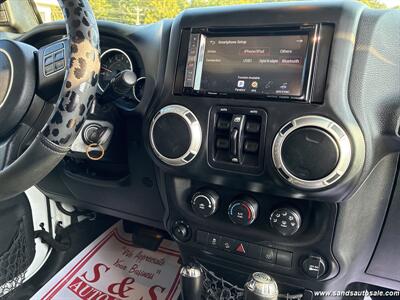 2015 Jeep Wrangler Unlimited Sahara   - Photo 23 - Lexington, TN 38351