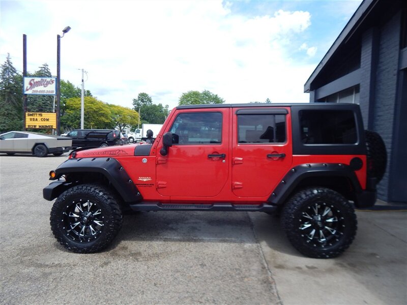 2014 Jeep Wrangler Unlimited Sahara  4wd - Photo 1 - Angola, IN 46703