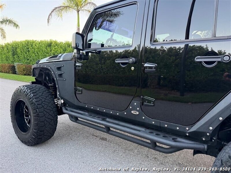 2017 Jeep Wrangler Unlimited Sport   - Photo 12 - Naples, FL 34104