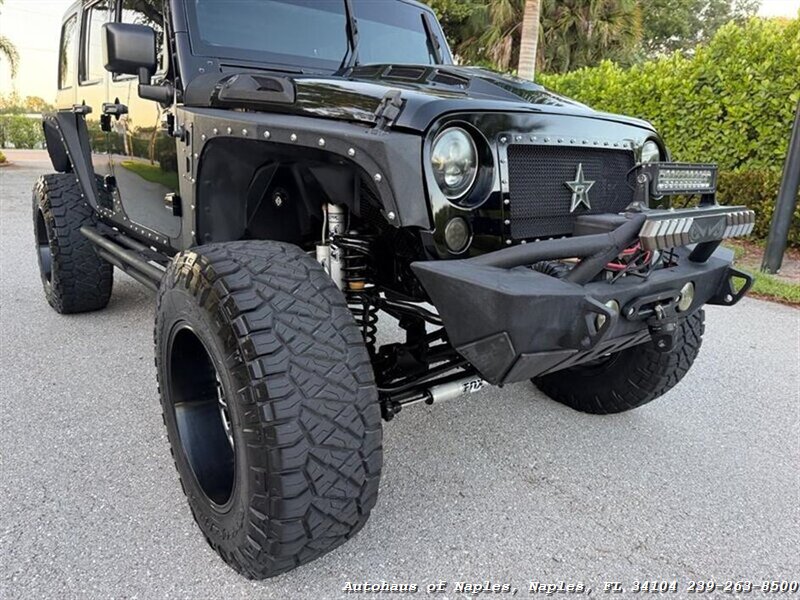 2017 Jeep Wrangler Unlimited Sport   - Photo 9 - Naples, FL 34104