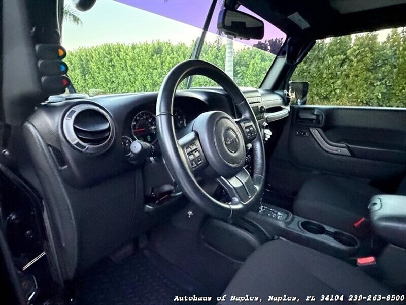 2017 Jeep Wrangler Unlimited Sport   - Photo 27 - Naples, FL 34104