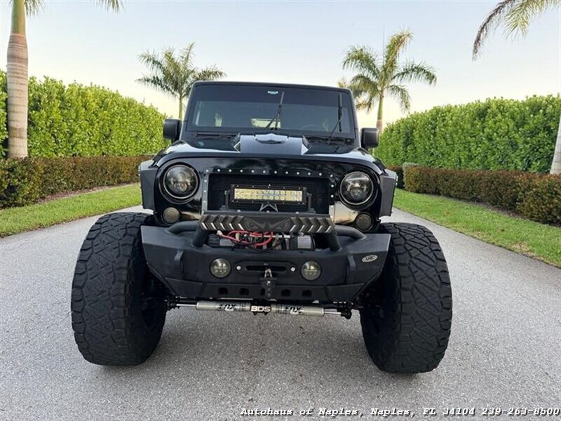 2017 Jeep Wrangler Unlimited Sport   - Photo 16 - Naples, FL 34104