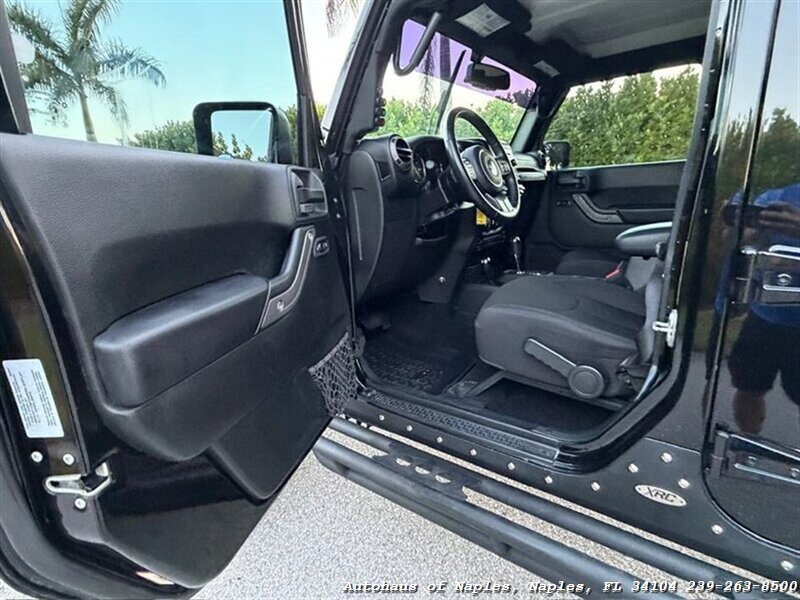 2017 Jeep Wrangler Unlimited Sport   - Photo 23 - Naples, FL 34104