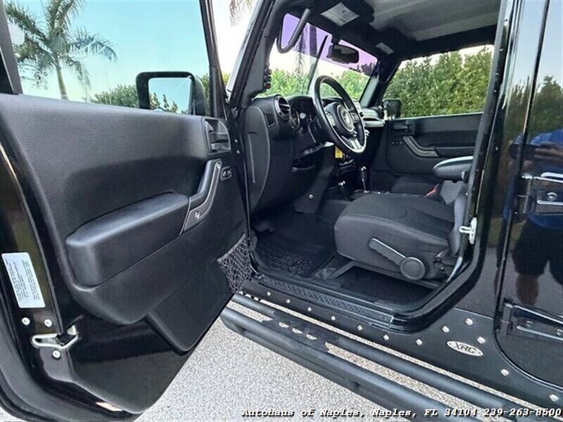 2017 Jeep Wrangler Unlimited Sport   - Photo 23 - Naples, FL 34104