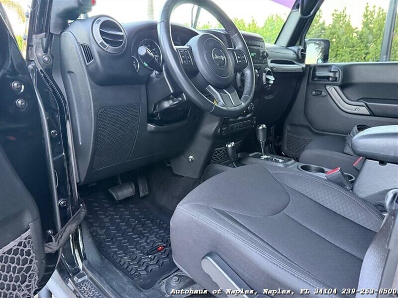 2017 Jeep Wrangler Unlimited Sport   - Photo 26 - Naples, FL 34104