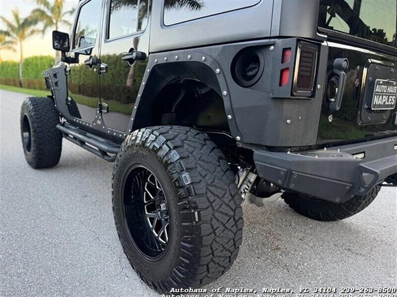 2017 Jeep Wrangler Unlimited Sport   - Photo 14 - Naples, FL 34104
