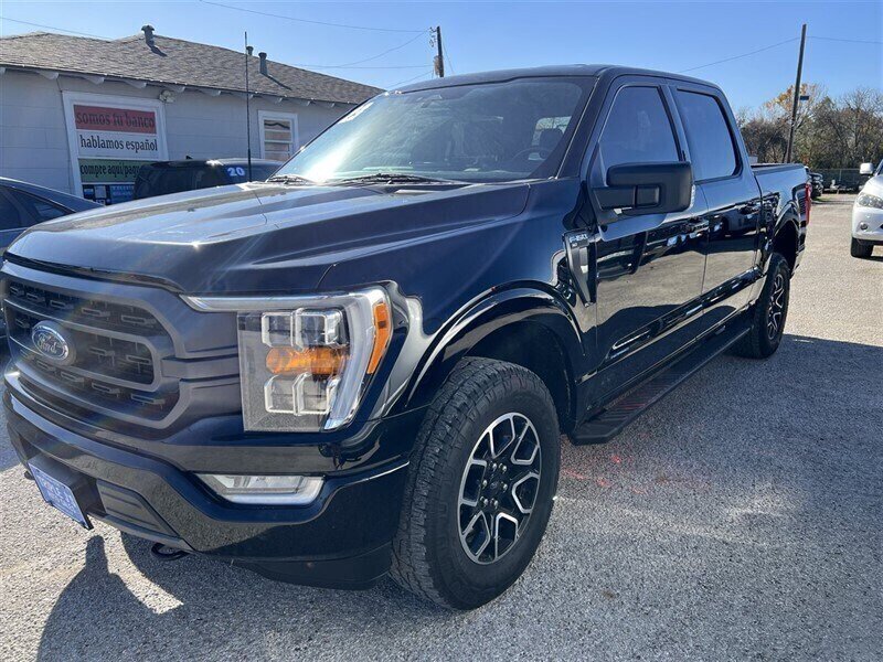 2023 Ford F-150 XLT   - Photo 1 - Lewisville, TX 75057