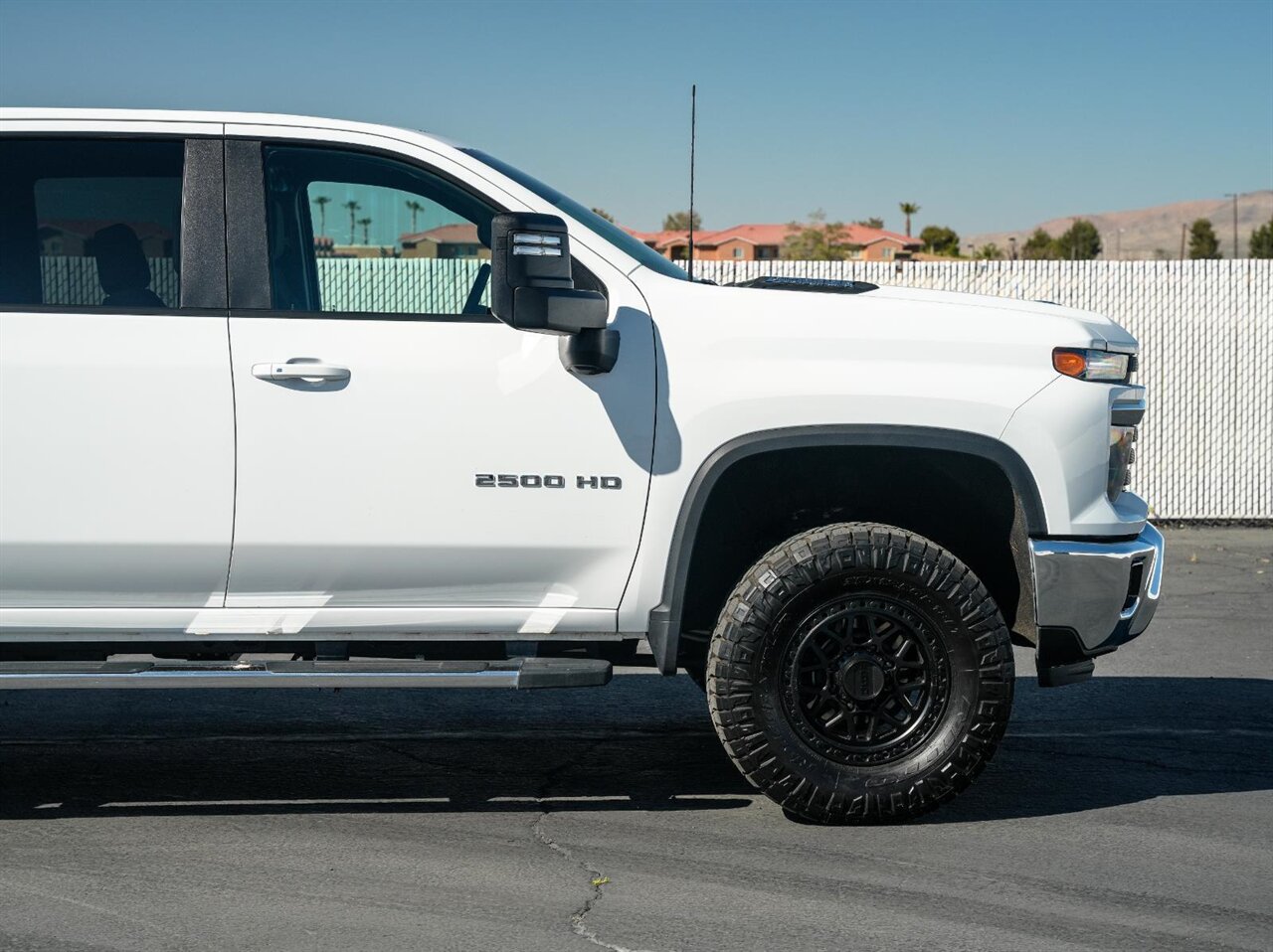 2025 Chevrolet Silverado 2500HD LT  Level Kit - KMC Wheels - Nitto Tires - Photo 11 - Victorville, CA 92392