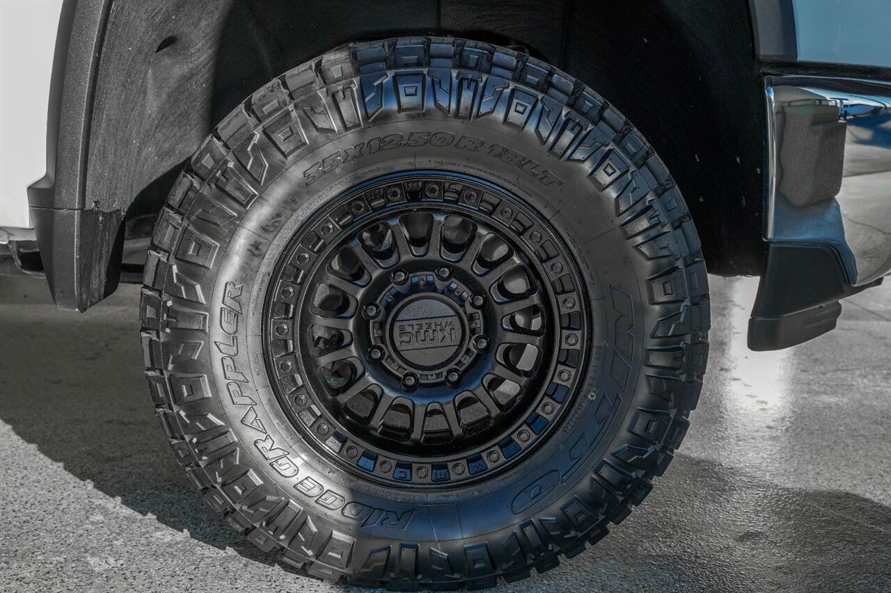 2024 Chevrolet Silverado 2500HD LTZ  Level Kit - KMC Wheels - Nitto Tires - Rhino Liner - Photo 11 - Victorville, CA 92392