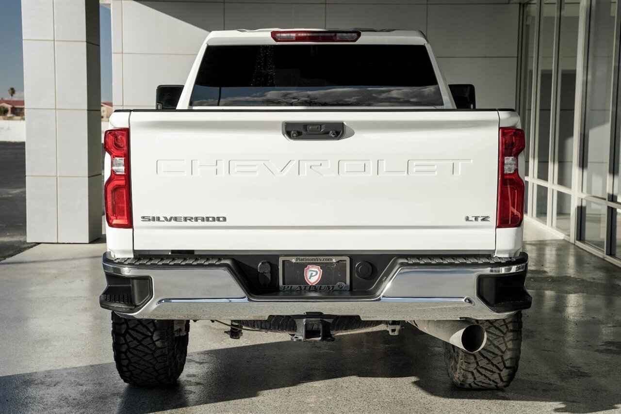 2024 Chevrolet Silverado 2500HD LTZ  Level Kit - KMC Wheels - Nitto Tires - Rhino Liner - Photo 8 - Victorville, CA 92392