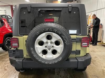 2013 Jeep Wrangler Sahara   - Photo 21 - Saint Louis, MI 48880-9800