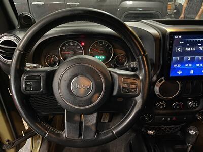 2013 Jeep Wrangler Sahara   - Photo 7 - Saint Louis, MI 48880-9800