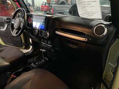 2013 Jeep Wrangler Sahara   - Photo 16 - Saint Louis, MI 48880-9800