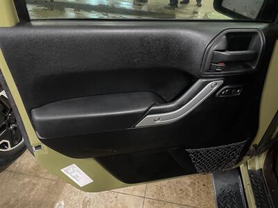 2013 Jeep Wrangler Sahara   - Photo 17 - Saint Louis, MI 48880-9800