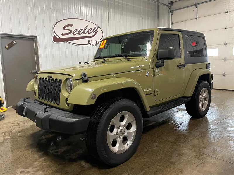 2013 Jeep Wrangler Sahara   - Photo 1 - Saint Louis, MI 48880-9800