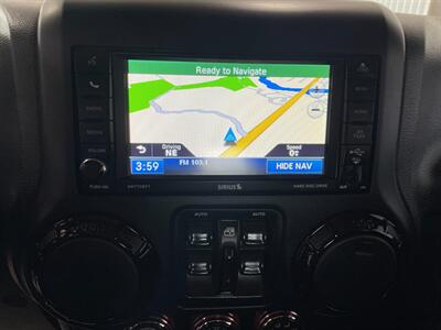 2012 Jeep Wrangler Unlimited Sahara   - Photo 12 - Saint Louis, MI 48880-9800
