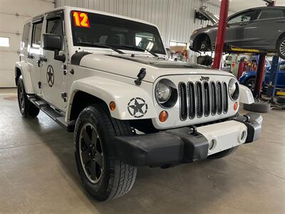 2012 Jeep Wrangler Unlimited Sahara   - Photo 3 - Saint Louis, MI 48880-9800