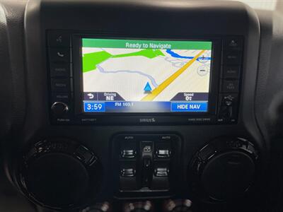 2012 Jeep Wrangler Unlimited Sahara   - Photo 24 - Saint Louis, MI 48880-9800